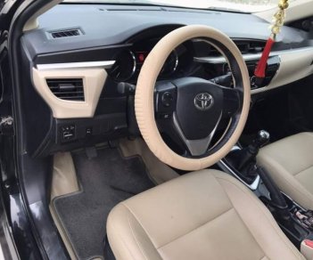 Toyota Corolla altis 2015 - Bán Toyota Corolla altis đời 2015, màu đen số sàn