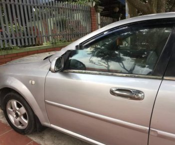 Daewoo Lacetti   2009 - Bán ô tô Daewoo Lacetti đời 2009, màu bạc xe gia đình