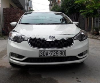 Kia K3 1.6 AT 2015 - Cần bán lại xe Kia K3 1.6 AT năm sản xuất 2015, màu trắng chính chủ, 520 triệu