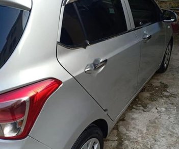 Hyundai Grand i10   1.0 MT Base 2016 - Cần bán lại xe Hyundai Grand i10 1.0 MT Base sản xuất năm 2016, màu bạc, nhập khẩu số sàn