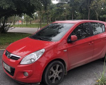 Hyundai i20 AT  2010 - Cần bán Hyundai i20 AT 2010, màu đỏ chính chủ, 335 triệu