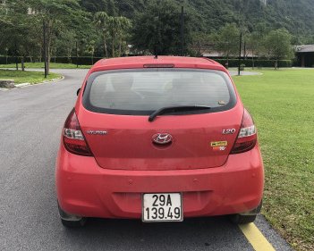 Hyundai i20 AT  2010 - Cần bán Hyundai i20 AT 2010, màu đỏ chính chủ, 335 triệu