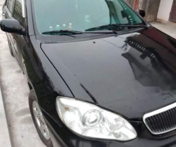 Toyota Corolla   2003 - Gia đình bán xe Toyota Corolla đời 2003, màu đen  