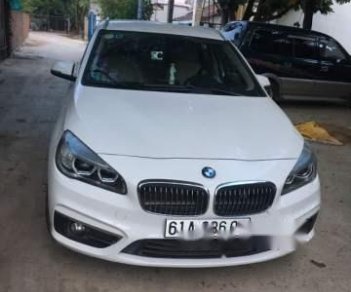 BMW 2 Series 218i 2015 - Bán xe BMW 2 Series 218i năm 2015, màu trắng còn mới, giá 900tr