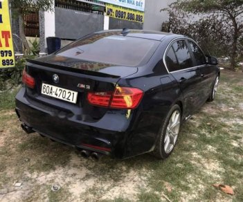 BMW 3 Series 320I 2014 - Cần bán gấp BMW 3 Series 320I sản xuất năm 2014, màu đen, nội thất zin, đồ chơi đầy đủ