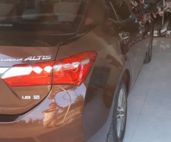 Toyota Corolla altis 1.8G MT 2015 - Bán Toyota Corolla altis 1.8G MT đời 2015, màu nâu, đẹp như mới