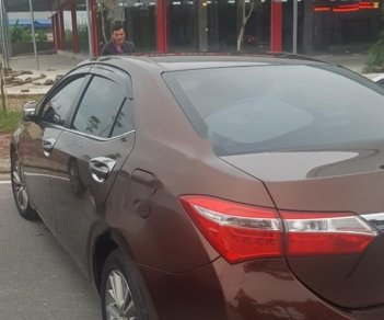 Toyota Corolla altis 1.8G MT 2015 - Bán Toyota Corolla altis 1.8G MT đời 2015, màu nâu, đẹp như mới