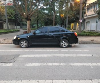 Daewoo Lacetti EX 1.6 MT 2004 - Gia đình bán ô tô Daewoo Lacetti EX 1.6 MT đời 2004, màu đen, 135tr