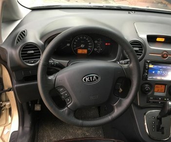 Kia Carens SX 2.0 AT  2013 - Bán xe Kia Carens SX đời 2014 số tự động, màu vàng biển Hà Nội