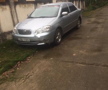 Toyota Corolla J 1.3 MT 2003 - Bán xe Toyota Corolla J 1.3 MT đời 2003, màu bạc như mới 