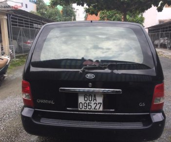 Kia Carnival 2006 - Bán Kia Carnival đời 2006, màu đen, nhập khẩu xe gia đình, giá tốt