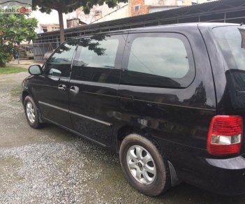 Kia Carnival 2006 - Bán Kia Carnival đời 2006, màu đen, nhập khẩu xe gia đình, giá tốt