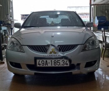 Mitsubishi Lancer 2004 - Cần bán lại xe Mitsubishi Lancer 2004, màu bạc số tự động, giá tốt