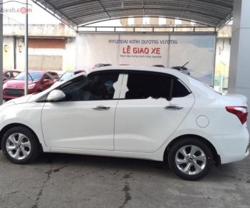 Hyundai Grand i10   1.2 AT 2019 - Cần bán Hyundai Grand i10 1.2 AT sản xuất 2019, màu trắng, xe có sẵn đủ màu giao ngay