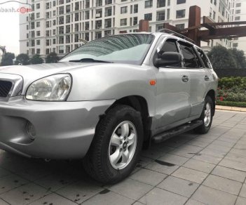 Hyundai Santa Fe Gold AT 2005 - Bán Hyundai Santa Fe Gold màu ghi bạc, 7 chỗ, số tự động, full options, ghế điện máy dầu