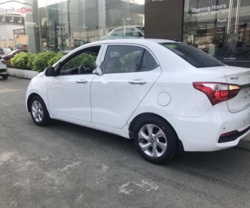 Hyundai Grand i10   1.2 AT 2019 - Cần bán Hyundai Grand i10 1.2 AT sản xuất 2019, màu trắng, xe có sẵn đủ màu giao ngay