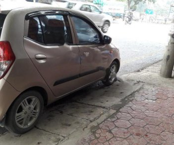 Hyundai i10 2010 - Cần bán Hyundai i10 năm sản xuất 2010, màu vàng cát