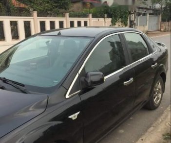 Ford Focus   1.8MT 2009 - Cần bán gấp Ford Focus 1.8MT đời 2009, màu đen, chính chủ