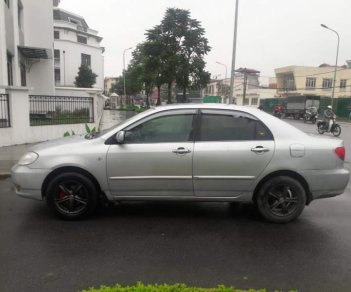 Toyota Corolla altis  1.8MT 2004 - Bán Toyota Corolla Altis 1.8MT đời 2004, màu bạc chính chủ, xe còn rất mới và đẹp