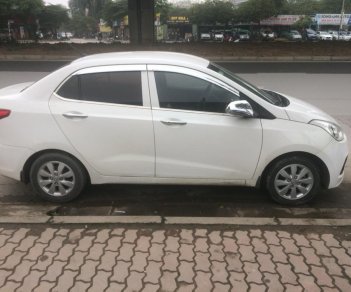 Hyundai Grand i10 1.2 2015 - Bán ô tô Hyundai Grand i10 đời 2015 màu trắng, giá 329 triệu