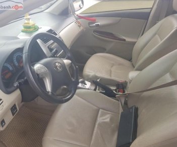 Toyota Corolla altis 1.8G AT 2010 - Bán xe Corolla Altis màu đen, số tự động, sx năm 2010 đăng ký 2011