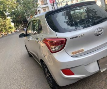 Hyundai Grand i10   2014 - Cần bán Hyundai Grand i10 đời 2014, màu bạc số tự động