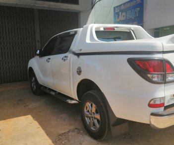 Mazda BT 50 2016 - Cần bán lại xe Mazda BT 50 đời 2016, màu trắng, bảo hành chính hãng