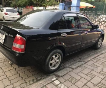 Mazda 323 2004 - Cần bán Mazda 323 năm sản xuất 2004, màu đen, nhập khẩu nguyên chiếc, giá cạnh tranh