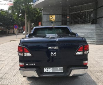 Mazda BT 50 2.2L 4x2 AT 2015 - Bán Mazda BT 50 2.2 số tự động 2015, Đk 2016, phom mới 2016 màu xanh đen