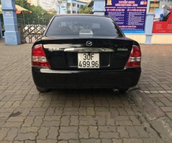 Mazda 323 2004 - Cần bán Mazda 323 năm sản xuất 2004, màu đen, nhập khẩu nguyên chiếc, giá cạnh tranh