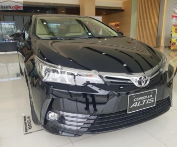 Toyota Corolla altis 1.8G AT 2019 - Cần bán Toyota Corolla Altis 1.8G AT đời 2019, màu đen, giá chỉ 771 triệu