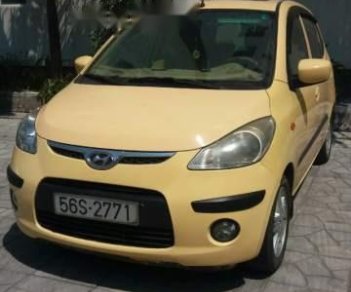 Hyundai i10   2010 - Bán ô tô Hyundai i10 đời 2010, màu vàng, đi được khoảng 86.000km