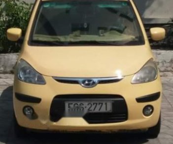 Hyundai i10   2010 - Bán ô tô Hyundai i10 đời 2010, màu vàng, đi được khoảng 86.000km