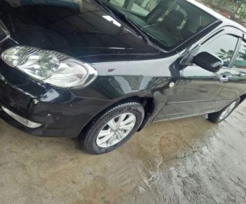 Toyota Corolla altis  1.8MT 2004 - Bán Toyota Corolla altis 1.8MT đời 2004, màu đen