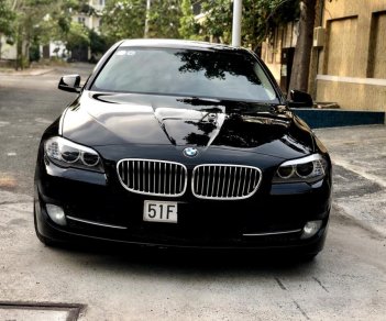 BMW 5 Series 520i 2013 - Cần bán lại xe BMW 520i Series, đăng ký lần đầu 2014, màu đen nhập khẩu nguyên chiếc