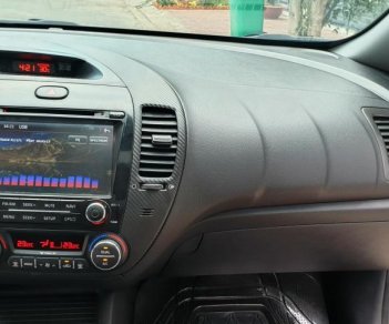 Kia K3 1.6 AT  2013 - Bán Kia K3 1.6 AT số tự động model 2014, Sx 2013, màu vàng 1 đời chủ mới 90%