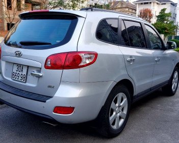 Hyundai Santa Fe   AT  2009 - Cần bán lại xe cũ Hyundai Santa Fe AT đời 2009, màu bạc như mới