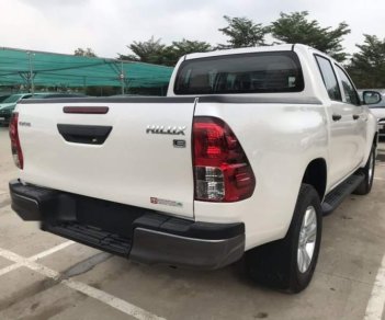 Toyota Hilux 2.4E 4x2 AT 2019 - Bán xe Toyota Hilux AT 2019, màu trắng, nhập khẩu, 695 triệu