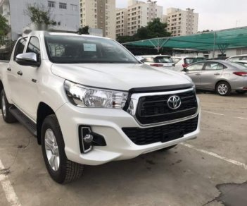 Toyota Hilux 2.4E 4x2 AT 2019 - Bán xe Toyota Hilux AT 2019, màu trắng, nhập khẩu, 695 triệu