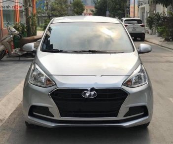 Hyundai Grand i10  1.2 MT Base 2018 - Cần bán lại xe Hyundai Grand i10 1.2 MT Base năm sản xuất 2018, màu bạc  