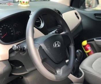 Hyundai Grand i10  1.2 MT Base 2018 - Cần bán lại xe Hyundai Grand i10 1.2 MT Base năm sản xuất 2018, màu bạc  