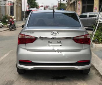 Hyundai Grand i10  1.2 MT Base 2018 - Cần bán lại xe Hyundai Grand i10 1.2 MT Base năm sản xuất 2018, màu bạc  