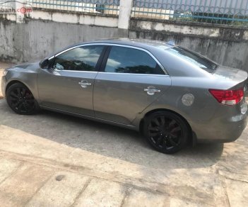 Kia Forte 2011 - Cần bán gấp Kia Forte sản xuất năm 2011, màu xám 