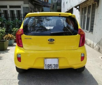 Kia Morning 1.25MT 2014 - Bán xe Kia Morning 1.25MT sản xuất năm 2014, màu vàng số sàn