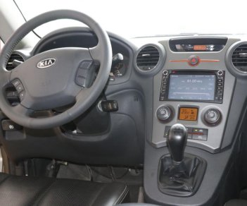 Kia Carens 2.0MT 2015 - Cần bán Kia Carens 2.0MT sản xuất năm 2015, màu vàng, giá chỉ 416 triệu