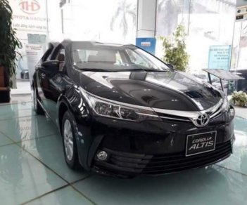 Toyota Corolla altis 1.8E 2019 - Bán Toyota Corolla altis 1.8E năm sản xuất 2019, màu đen