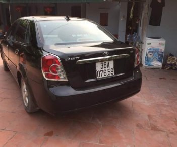 Daewoo Lacetti   2004 - Cần bán lại xe Daewoo Lacetti 2004, màu đen