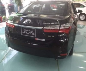 Toyota Corolla altis 1.8E 2019 - Bán Toyota Corolla altis 1.8E năm sản xuất 2019, màu đen