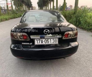 Mazda 6 2.0 MT 2003 - Cần bán gấp Mazda 6 2.0 MT đời 2003, màu đen