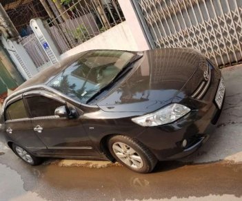 Toyota Corolla altis 1.8MT 2009 - Cần bán lại xe Toyota Corolla altis 1.8MT đời 2009, màu đen số sàn 